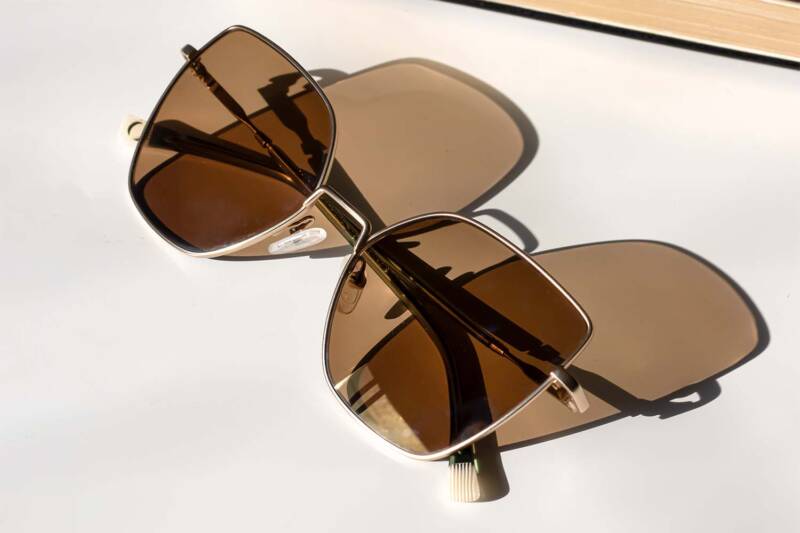 Photochromic lenses that darken in the sun with a brown tint